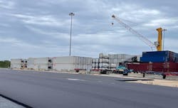 Three six-inch asphalt layers support heavy stresses from loaders and containers.